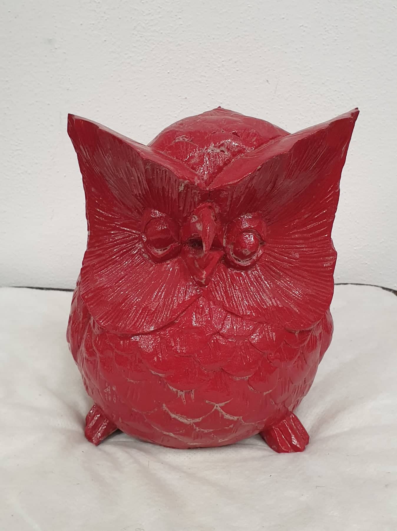 Red wooden handmade owl statue