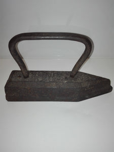 A very old cast iron on charcoal. Antique iron