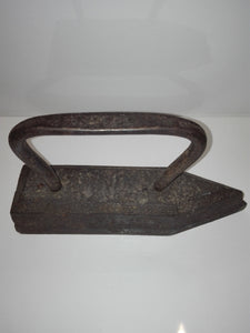 A very old cast iron on charcoal. Antique iron